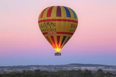 1 hour Barossa Valley Sunrise Hot Air Balloon Flight with Breakfast.  Book online to secure your spot on this once in a lifetime experience.  Visit Sightseeing Pass Australia for details and prices.