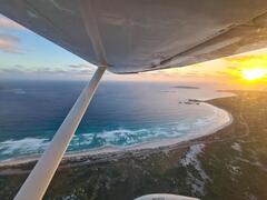 Sunsets on a scenic flight of Esperance, Cape Le Grand National Park and Lucky Bay with Fly Esperance and Sightseeing Pass Australia